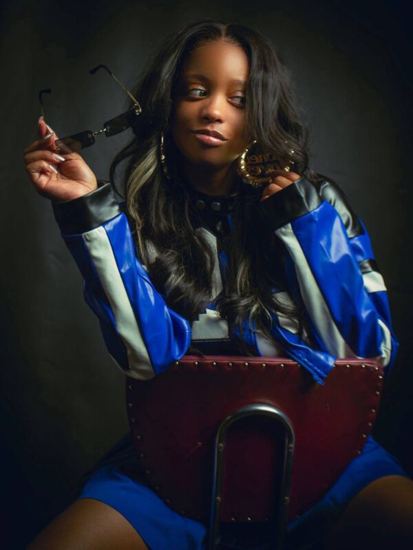 Woman two-piece Leather jacket with a skirt